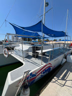 Trimarán Lola