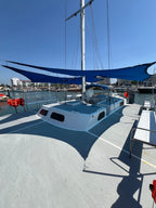 Trimarán Lola